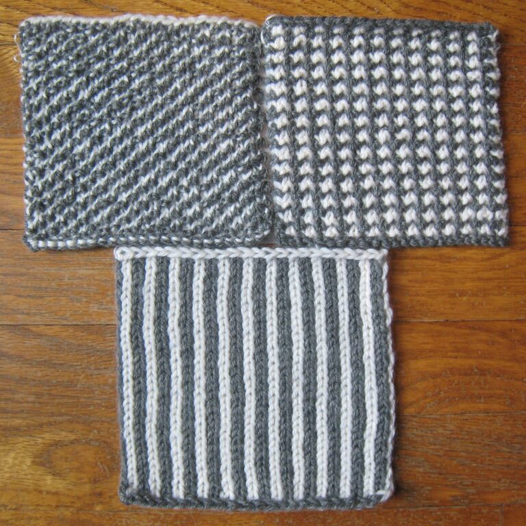 A photo showing 3 different stitch samples that will be taught in this class. The top left sample shows a square with blue and white diagonal stripes. The top right samples shows a square with blue and white stitches in a checkerboard pattern. The sample on the bottom shows a square with blue and white vertical stripes.